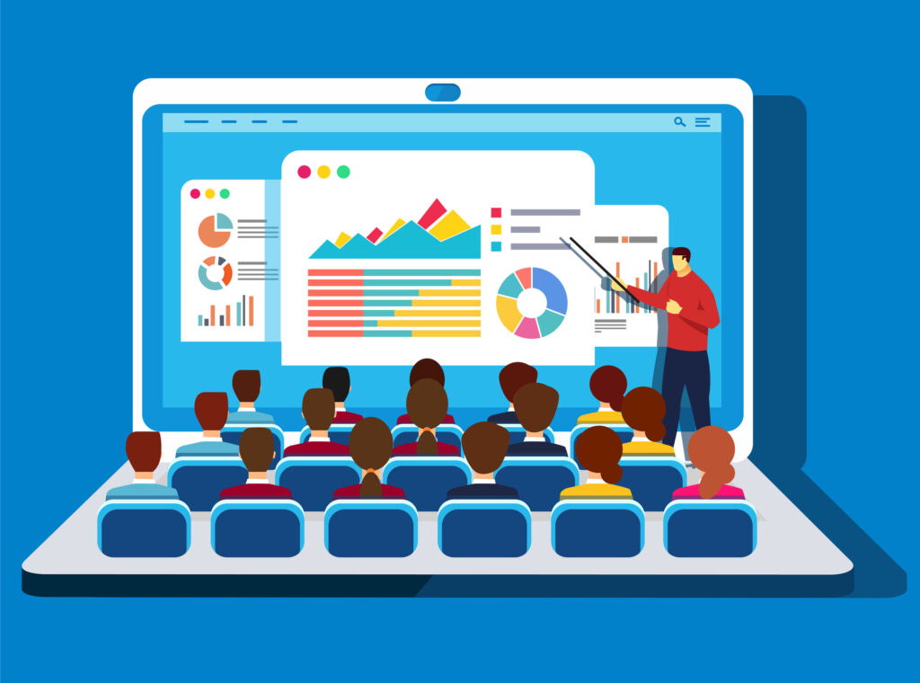 A cartoon laptop graphic image with the keys on the keyboard as seats in a classroom and the instructors at the front teaching on the laptop's screen.